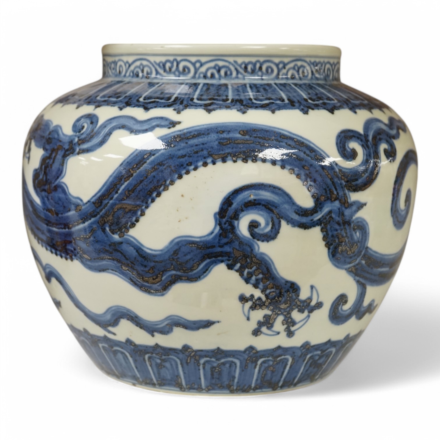 A Chinese large blue and white ‘dragon’ jar, 29cm. Condition - good